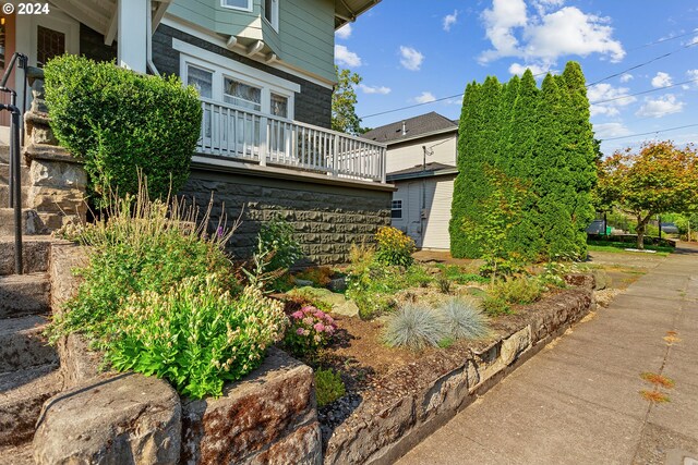 view of home's exterior featuring a balcony