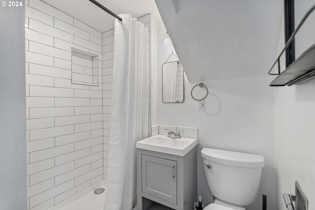 bathroom with vanity, toilet, and a shower with shower curtain