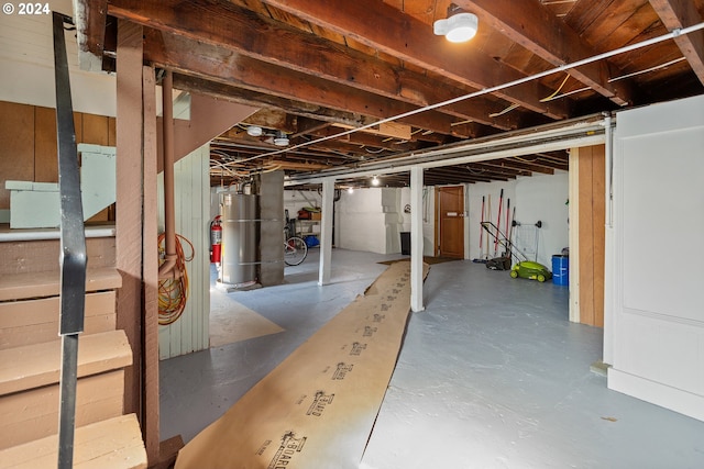 basement featuring secured water heater