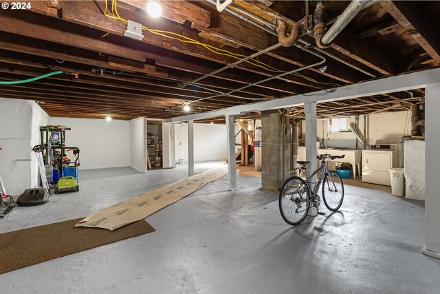 basement featuring washer and dryer