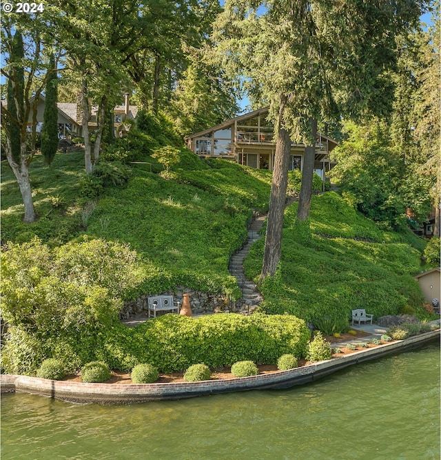 view of yard with a water view