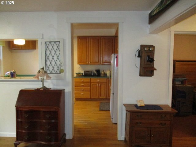 hall featuring hardwood / wood-style flooring