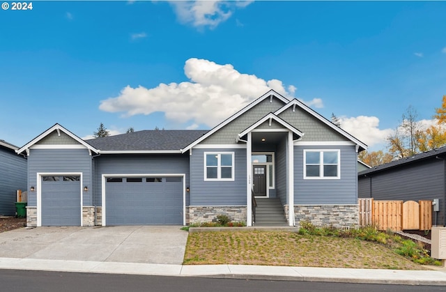 craftsman-style home with a garage