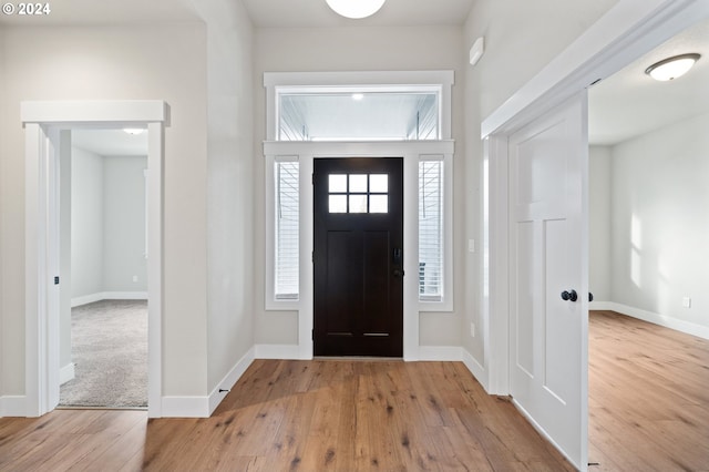 entrance foyer with light wood-type flooring