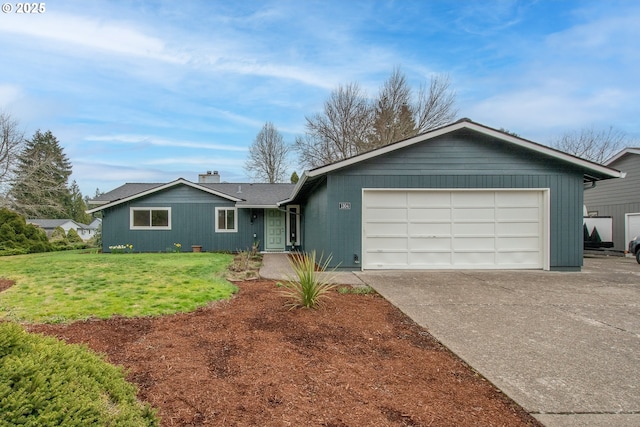 ranch-style house featuring a front lawn, an attached garage, driveway, and a chimney