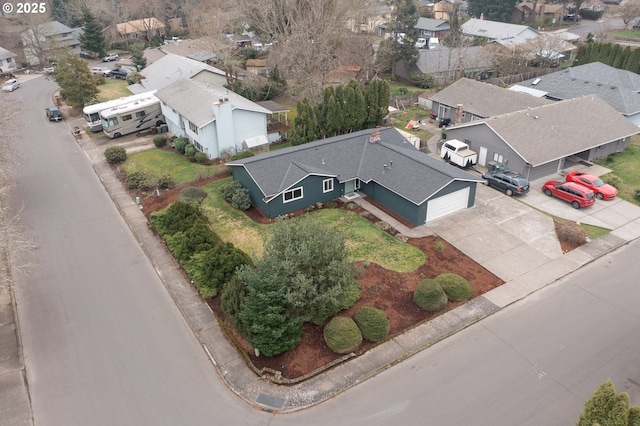 birds eye view of property with a residential view