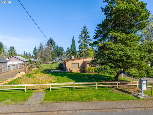 view of front of home featuring a front yard