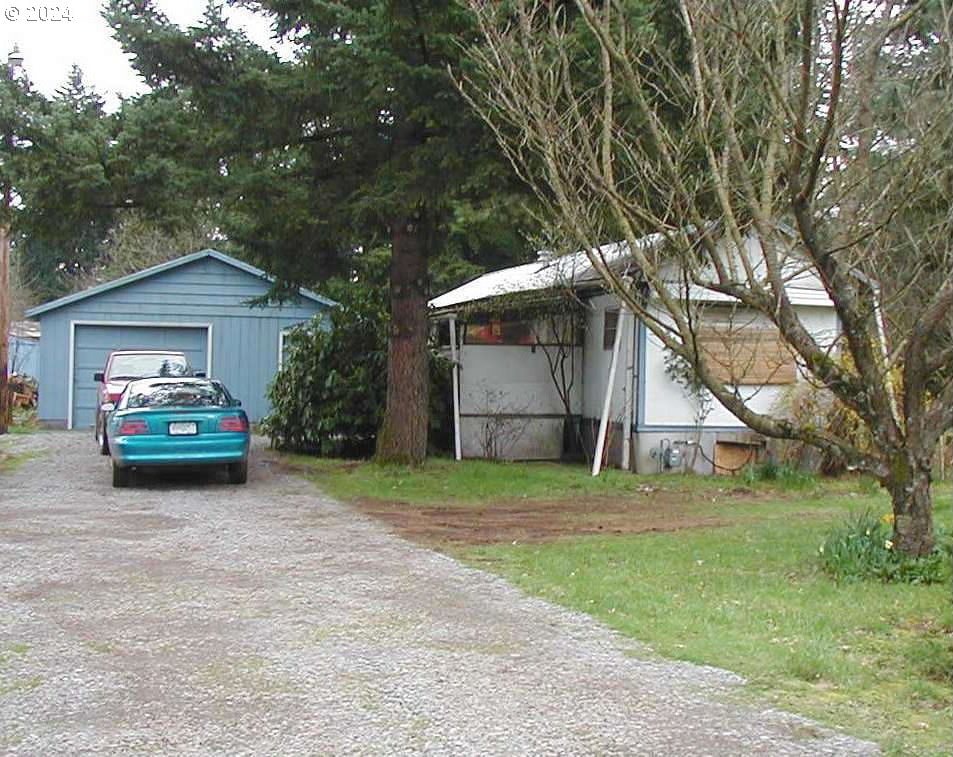 view of property exterior with a garage