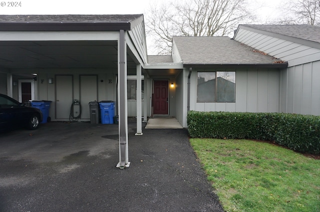 view of front of property with a carport