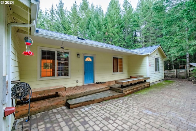 exterior space featuring a patio and a deck