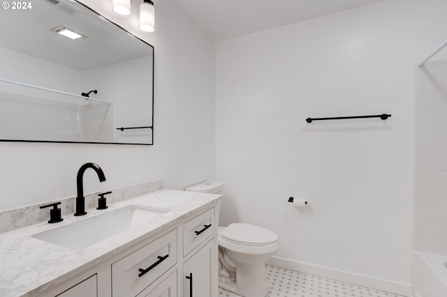 full bathroom with vanity, tub / shower combination, and toilet