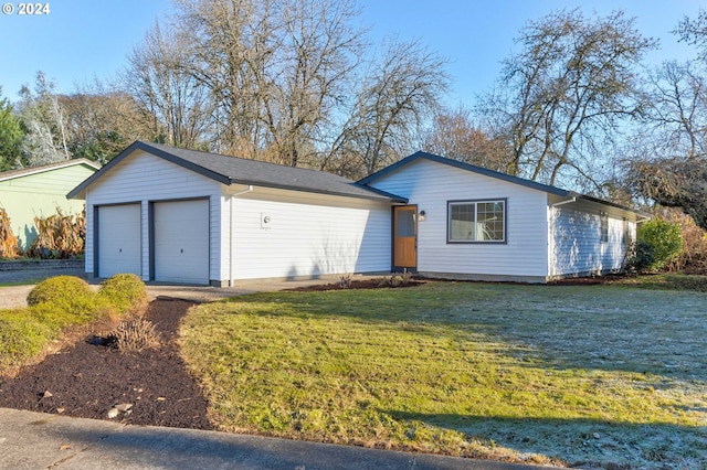 ranch-style home with a front lawn