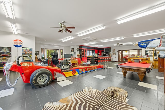 playroom with ceiling fan, billiards, and dark tile patterned floors