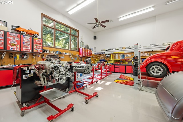27050 SW Petes Mountain Rd, West Linn, OR 97068 - garage with a workshop area and ceiling fan