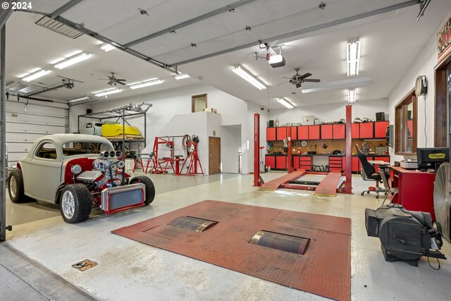 27050 SW Petes Mountain Rd, West Linn, OR 97068 - garage with ceiling fan and a garage door opener