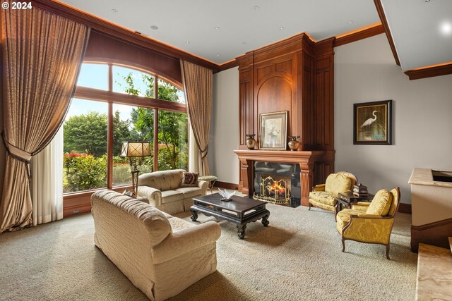 27050 SW Petes Mountain Rd, West Linn, OR 97068 - carpeted living area featuring crown molding, healthy amount of natural light, a glass covered fireplace, and baseboards