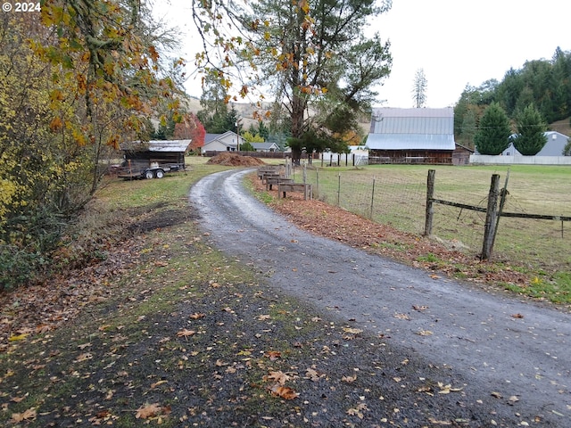 view of street featuring a rural view