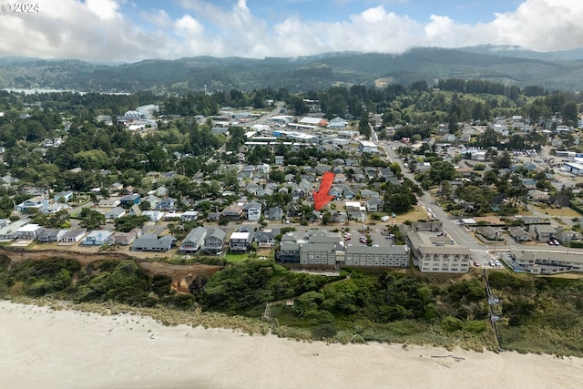 drone / aerial view featuring a mountain view