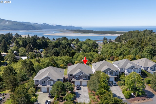 aerial view with a water and mountain view