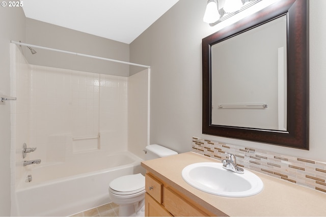 full bathroom with tasteful backsplash, bathtub / shower combination, vanity, and toilet