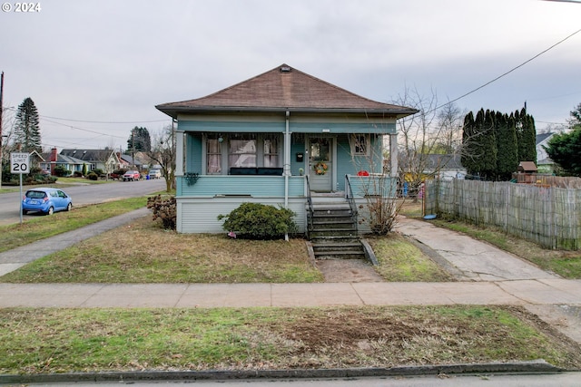 bungalow featuring a porch