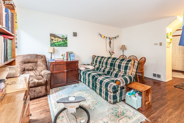 living room with wood-type flooring