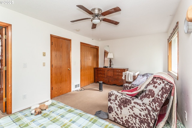 sitting room with light carpet and ceiling fan