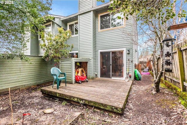 rear view of property with a deck