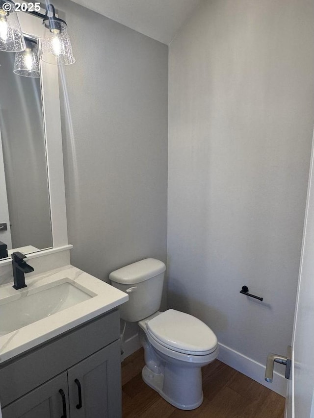 1918 S Holly St, Canby, OR 97013 - empty room featuring wood finished floors, a ceiling fan, and baseboards
