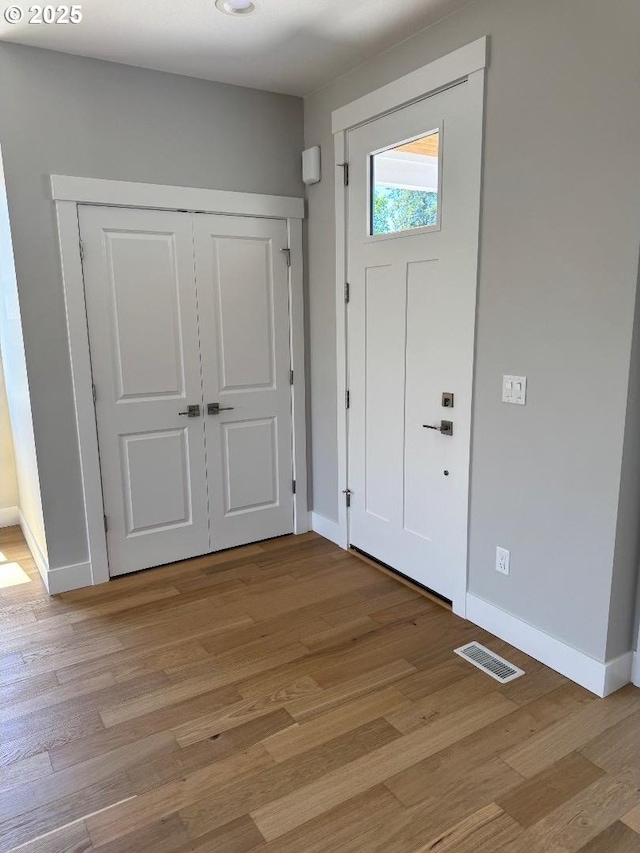 1918 S Holly St, Canby, OR 97013 - entrance foyer featuring baseboards and light wood finished floors