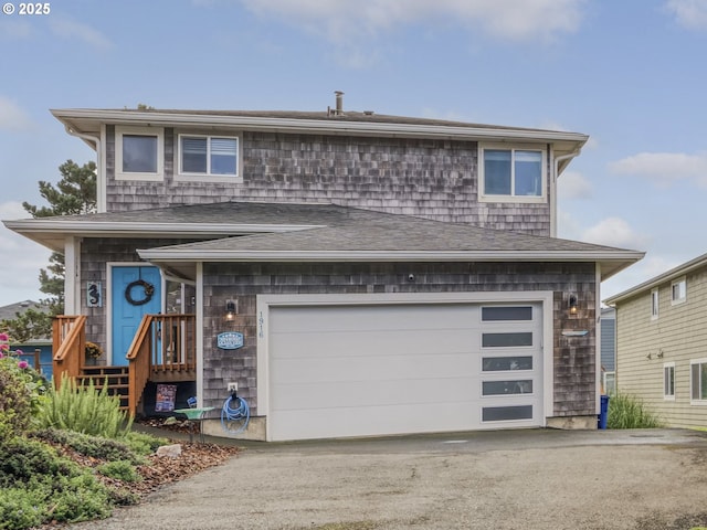 view of front of property featuring a garage