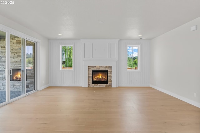 1218 9th St Lot 3, West Linn, OR 97068 - unfurnished living room with a fireplace, light wood finished floors, plenty of natural light, and recessed lighting