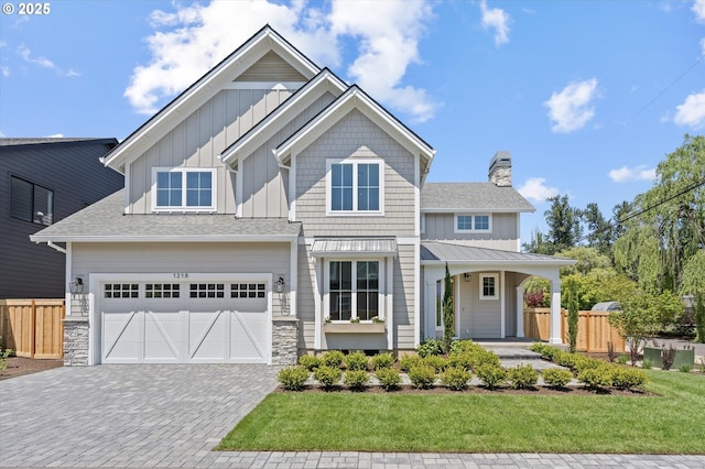 1218 9th St Lot 3, West Linn, OR 97068 - view of front of home featuring board and batten siding, decorative driveway, a chimney, roof with shingles, and an attached garage
