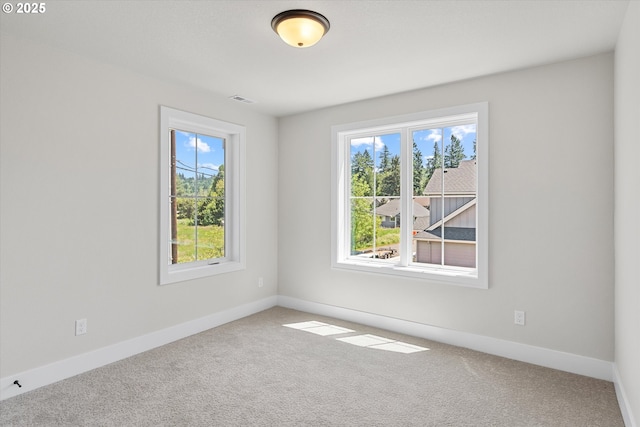 1218 9th St Lot 3, West Linn, OR 97068 - carpeted empty room featuring healthy amount of natural light and baseboards