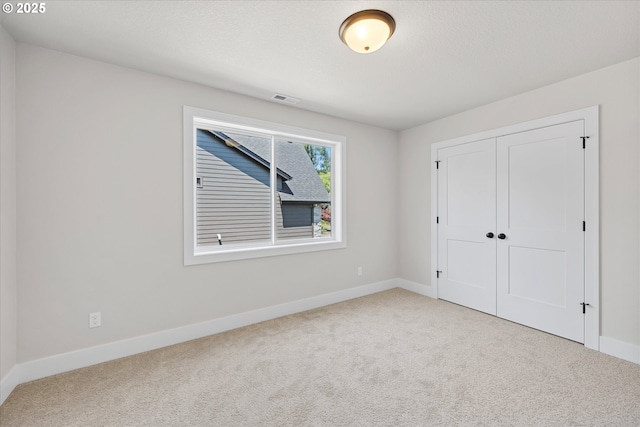 1218 9th St Lot 3, West Linn, OR 97068 - unfurnished bedroom with carpet flooring, baseboards, and a closet