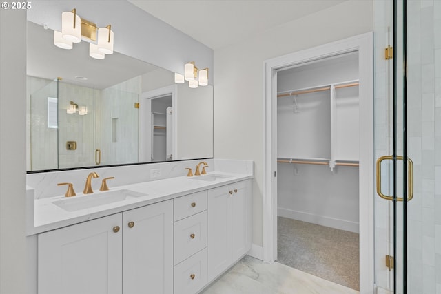 1218 9th St Lot 3, West Linn, OR 97068 - bathroom featuring a walk in closet, double vanity, a shower stall, baseboards, and marble finish floors