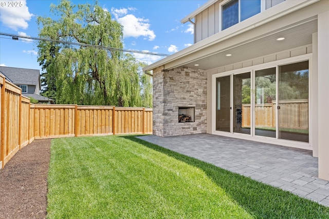 1218 9th St Lot 3, West Linn, OR 97068 - view of yard featuring an outdoor stone fireplace and a patio