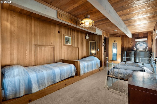 bedroom featuring wooden ceiling, wood walls, beam ceiling, and carpet flooring