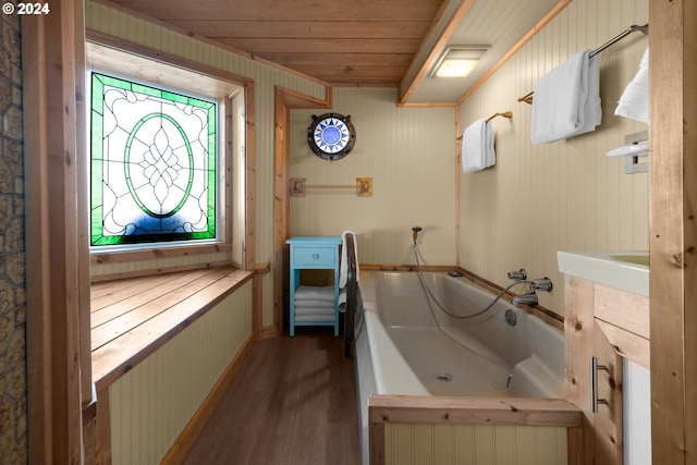 bathroom featuring wood walls, wood ceiling, wood-type flooring, and a tub