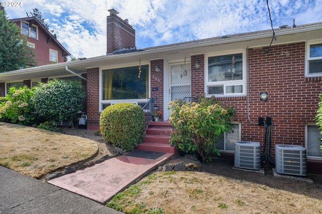 view of front of home with central AC unit