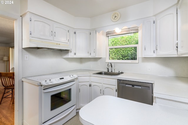 kitchen featuring white range with electric stovetop, dishwasher, white cabinets, and sink