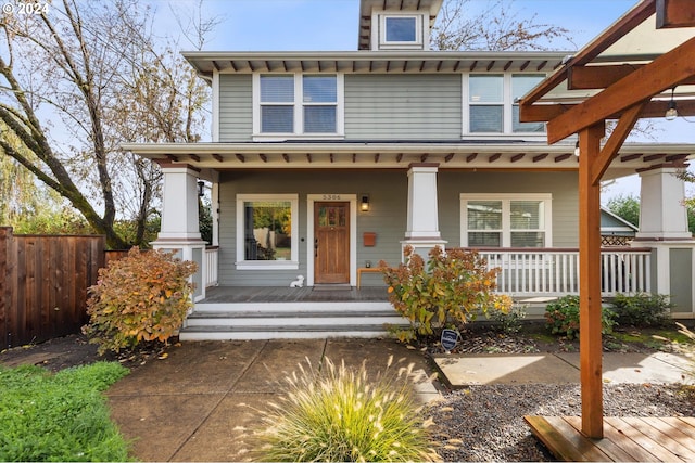 italianate-style house featuring covered porch