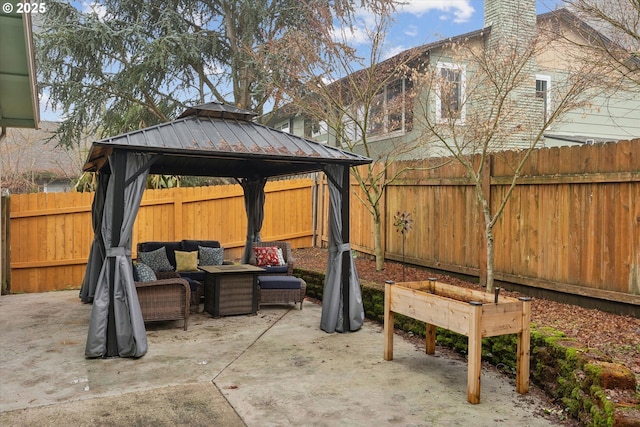 view of patio / terrace featuring a gazebo and an outdoor living space