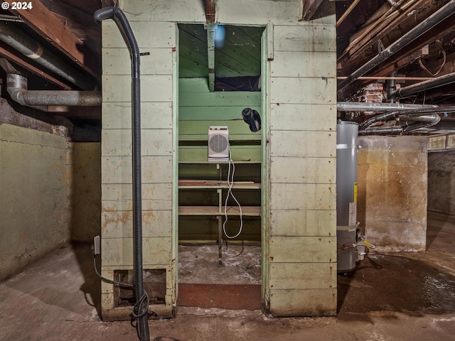 basement featuring gas water heater