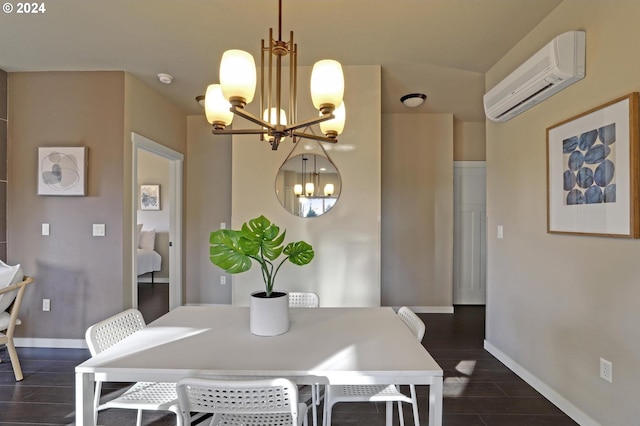 dining room with a wall unit AC, dark wood-type flooring, and a notable chandelier