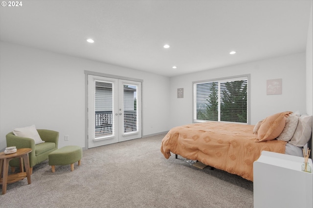 bedroom featuring access to outside, carpet floors, and french doors