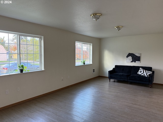 9845 N Lombard St, Portland, OR 97203 - sitting room featuring wood finished floors and baseboards