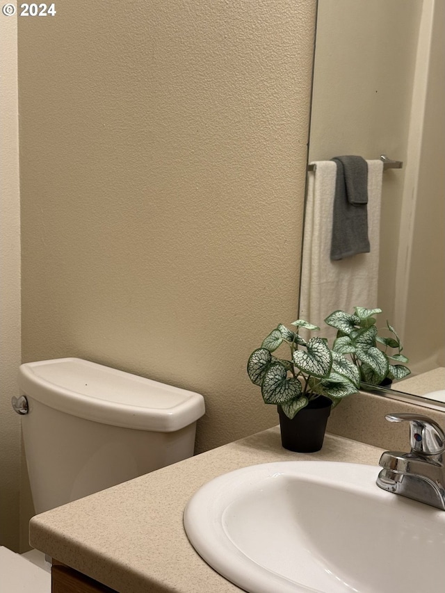 9845 N Lombard St, Portland, OR 97203 - bathroom with vanity and toilet