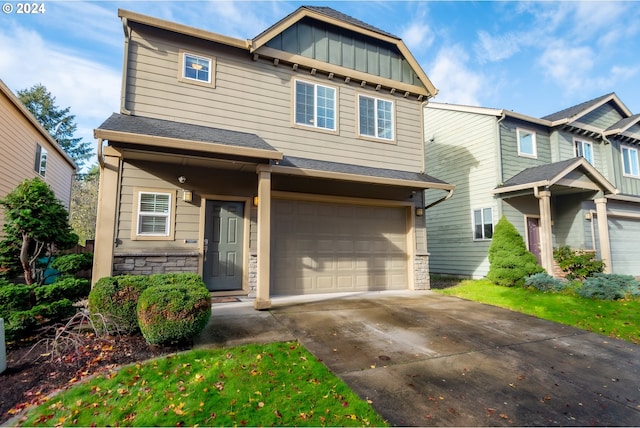 craftsman house featuring a garage