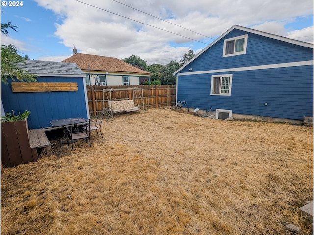 view of yard with fence